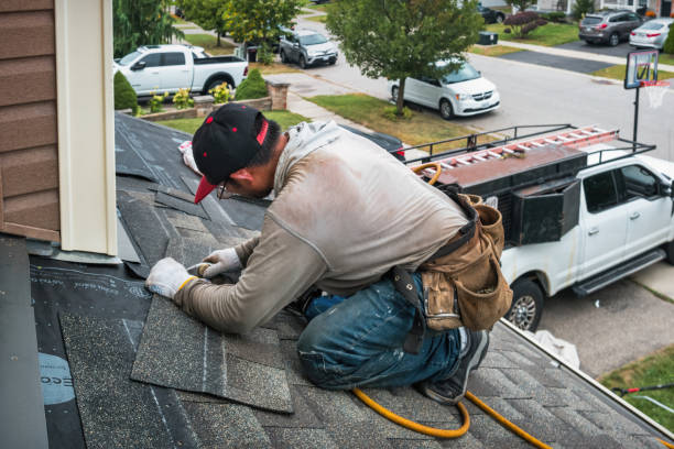 Professional Roof Repair technician working in National Park, NJ
